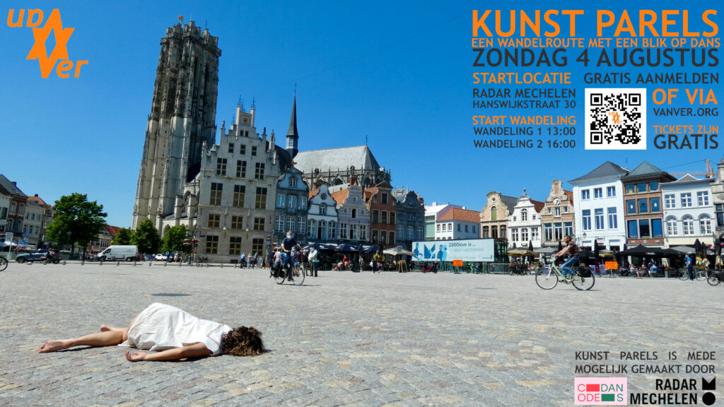 Danser liggend midden op de grote markt van Mechelen. 